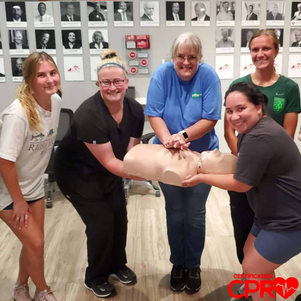 Group CPR training session in Tallahassee with certification course.