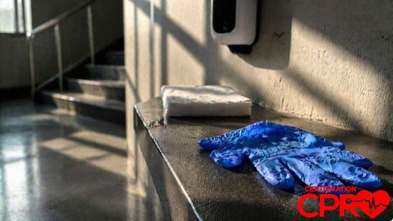 CPR training gloves and mask on a training station in Tallahassee.